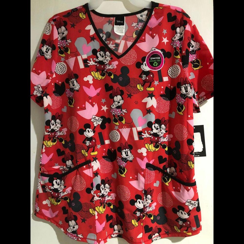 DISNEY SHORT SLEEVE BLOUSE. SIZE MEDIUM. NEW WITH TAGS